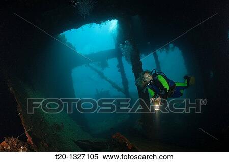 Scuba Diver at Liberty Wreck, Tulamben, Bali, Indonesia View Large Photo Image Stock Photography - Scuba Diver at Liberty Wreck, Tulamben, Bali, Indonesia. Fotosearch
