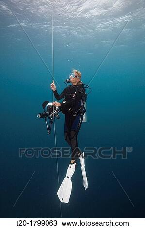 Scuba Diver doing Safety stop with Buoy, Baa Atoll, Indian Ocean, Maldives View Large Photo Image Stock Image - Scuba Diver doing Safety stop with Buoy, Baa Atoll, Indian Ocean, Maldives. Fotosearch