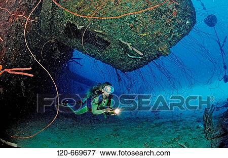 Stock Photo - Scuba diver on the Hilma Hooker Ship Wreck, Netherlands Antilles, Bonaire, Caribbean Sea. Fotosearch
