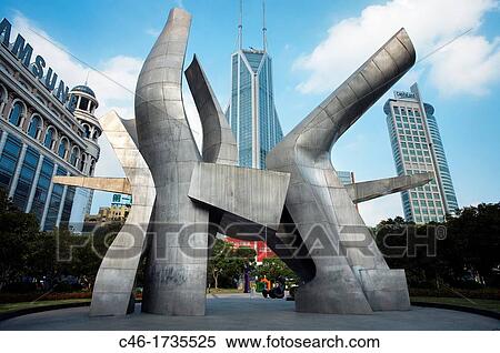 Stock Photography - Sculpture and Sofitel hotel on the background, Renmin Guangchang, People's Square, Shanghai, China.. Fotosearch