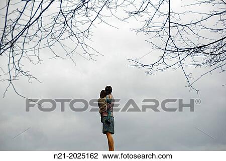 Sculpture on an advertising column by artist Christoph Poggeler. Dusseldorf. North Rhine-Westfalia, Germany, Europe. View Large Photo Image Stock Image - Sculpture on an advertising column by artist Christoph Poggeler. Dusseldorf. North Rhine-Westfalia, Germany, Europe.. Fotosearch