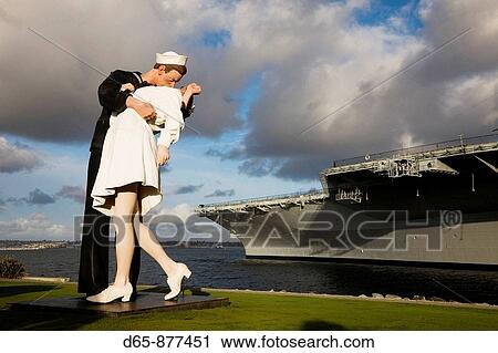 Sculpture Unconditional Surrender by J. Seward Johnson alongside USS Midway aircraft carrier, San Diego waterfront, San Diego, California, USA View Large Photo Image Stock Image - Sculpture Unconditional Surrender by J. Seward Johnson alongside USS Midway aircraft carrier, San Diego waterfront, San Diego, California, USA. Fotosearch