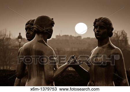 Sculptures at sunset from Tuileries Garden Paris, France View Large Photo Image Stock Image - Sculptures at sunset from Tuileries Garden Paris, France. Fotosearch