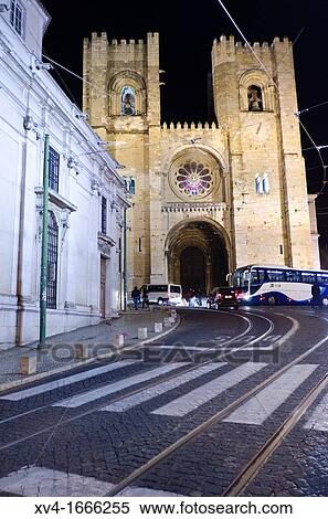 Stock Photography - Se Cathedral facade at Alfama Quarter in the Night, Lisbon, Portugal. Fotosearch