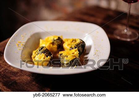 Sea bass stuffed tortellacci pasta, Venice, Italy. View Large Photo Image Stock Photo - Sea bass stuffed tortellacci pasta, Venice, Italy.. Fotosearch