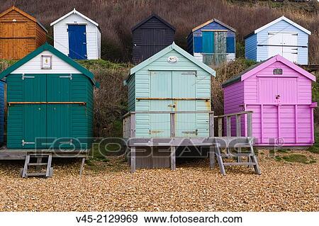 Sea coast with beach huts, Milford on Sea, Hampshire, South England, UK. View Large Photo Image Stock Photo - Sea coast with beach huts, Milford on Sea, Hampshire, South England, UK.. Fotosearch