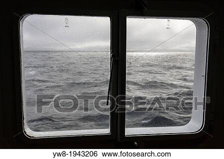 Sea- from the window of the Akademik Sergey Vavilov -Russian ice breaker used as a cruise ship for polar regions. Greenland. View Large Photo Image Stock Photograph - Sea- from the window of the Akademik Sergey Vavilov -Russian ice breaker used as a cruise ship for polar regions. Greenland.. Fotosearch