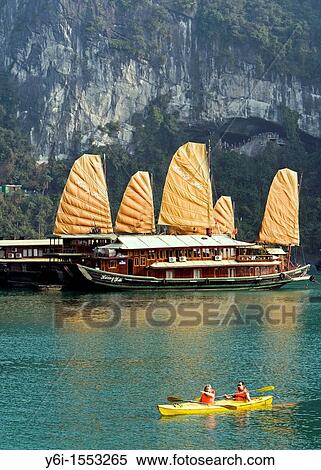 Sea kayaking near the rocky islands of Halong Bay Vietnam View Large Photo Image Stock Photography - Sea kayaking near the rocky islands of Halong Bay Vietnam. Fotosearch