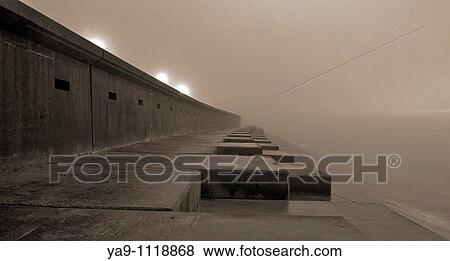 Sea mist at high tide View Large Photo Image Stock Photo - Sea mist at high tide. Fotosearch