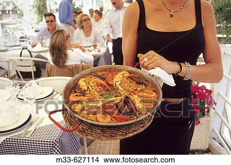 Seafood Paella in? Los Titorros Restaurant? at the harbour. Alicante. Comunidad Valenciana. Spain. View Large Photo Image Picture - Seafood Paella in? Los Titorros Restaurant? at the harbour. Alicante. Comunidad Valenciana. Spain.. Fotosearch