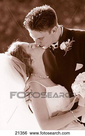 Sealed with a kiss. Wedding couple in black and white View Large Photo Image Stock Photograph - Sealed with a kiss. Wedding couple in black and white. Fotosearch