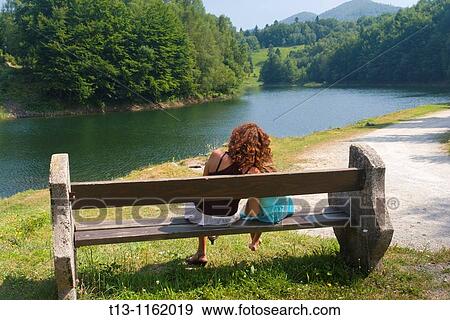 Seating togehter mother and daughter View Large Photo Image Stock Photo - Seating togehter mother and daughter. Fotosearch