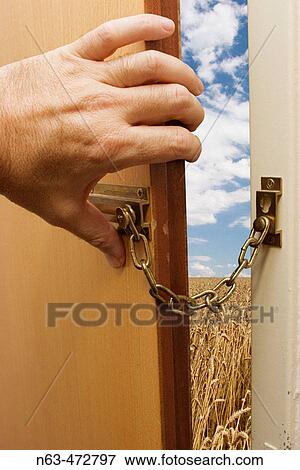 Security door chain View Large Photo Image Stock Photo - Security door chain. Fotosearch