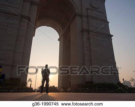 Security guard standing at India Gate in New Delhi, India. View Large Photo Image Stock Photography - Security guard standing at India Gate in New Delhi, India.. Fotosearch
