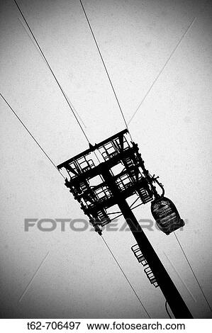 Stock Photo - Seen from below the lift of Baqueira-Beret, Spain, in the midst of a snowstorm. Fotosearch