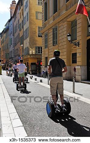 Stock Image - segway, Prefecture street, Nice, Alpes-Maritimes department, Provence-Alpes-Cote d? Azur region, southeast of France, Europe. Fotosearch