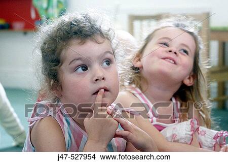 selective focus, Headshot, 2 little girls together View Large Photo Image Picture - selective focus, Headshot, 2 little girls together. Fotosearch