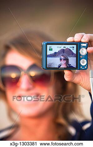 Self picture as seen through a digital viewfinder on Polihale State Beach, Kauai, Hawaii, USA View Large Photo Image Stock Image - Self picture as seen through a digital viewfinder on Polihale State Beach, Kauai, Hawaii, USA. Fotosearch