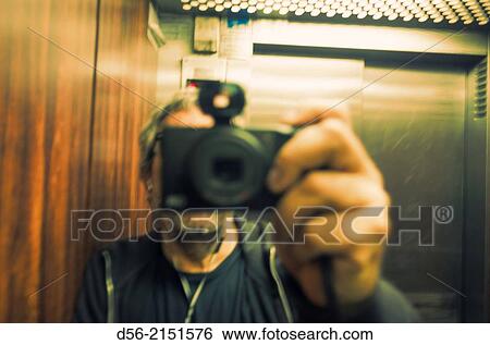 self portrait in a lift. View Large Photo Image Stock Photograph - self portrait in a lift.. Fotosearch
