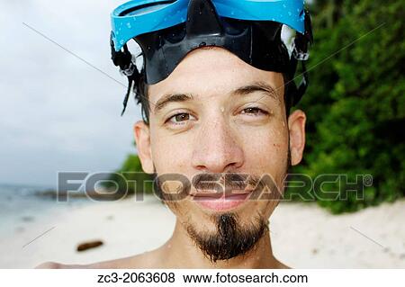 Self-portrait of a man with a diving mask, Island Pulau Perhentian Kecil, China sea, Terengganu, Malaysia. View Large Photo Image Stock Photo - Self-portrait of a man with a diving mask, Island Pulau Perhentian Kecil, China sea, Terengganu, Malaysia.. Fotosearch