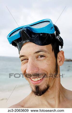 Self-portrait of a man with a diving mask, Island Pulau Perhentian Kecil, China sea, Terengganu, Malaysia. View Large Photo Image Stock Photo - Self-portrait of a man with a diving mask, Island Pulau Perhentian Kecil, China sea, Terengganu, Malaysia.. Fotosearch