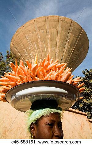 Stock Image - Selling carrots. Mopti, Mali, Africa. Fotosearch