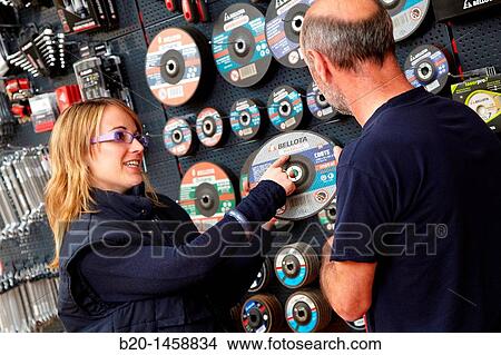 Selling grinding wheels in a hardware store View Large Photo Image Picture - Selling grinding wheels in a hardware store. Fotosearch