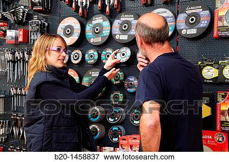Selling grinding wheels in a hardware store View Large Photo Image Stock Photo - Selling grinding wheels in a hardware store. Fotosearch