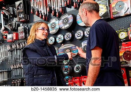Stock Photography - Selling grinding wheels in a hardware store. Fotosearch