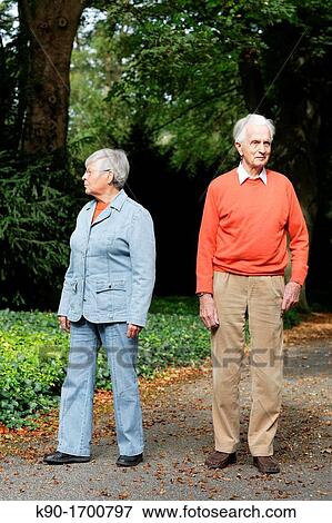 Senior caucasian couple, looking angry to the side, standing, blurred background, Hamburg, Germany, Europe View Large Photo Image Stock Photo - Senior caucasian couple, looking angry to the side, standing, blurred background, Hamburg, Germany, Europe. Fotosearch