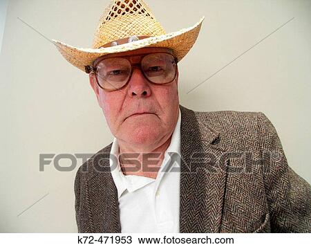 Stock Image - Senior Citizen in Cowboy Hat. Fotosearch