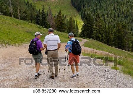 Senior citizen men hiking in the mountain of Vail Colorado View Large Photo Image Stock Image - Senior citizen men hiking in the mountain of Vail Colorado. Fotosearch
