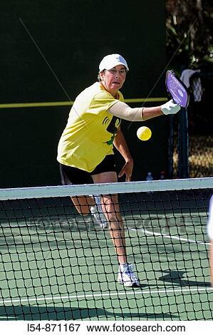 Senior citizens compete in game of Pickleball in the Senior state Olympics near Naples Florida View Large Photo Image Stock Photo - Senior citizens compete in game of Pickleball in the Senior state Olympics near Naples Florida. Fotosearch