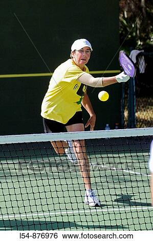 Senior citizens compete in game of Pickleball in the Senior state Olympics near Naples Florida View Large Photo Image Stock Photograph - Senior citizens compete in game of Pickleball in the Senior state Olympics near Naples Florida. Fotosearch