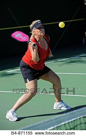 Senior citizens compete in game of Pickleball in the Senior state Olympics near Naples Florida View Large Photo Image Stock Photography - Senior citizens compete in game of Pickleball in the Senior state Olympics near Naples Florida. Fotosearch