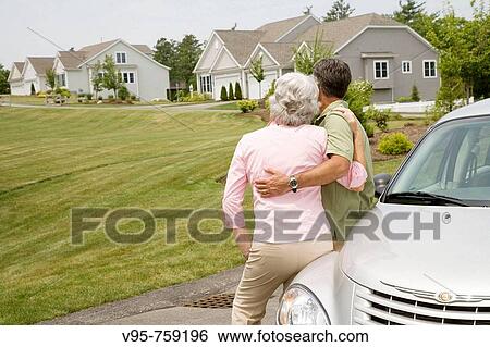 Senior couple at residential area View Large Photo Image Stock Photograph - Senior couple at residential area. Fotosearch
