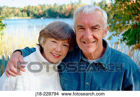 Senior couple, autumn. Gatineau Park. Quebec. Canada View Large Photo Image Picture - Senior couple, autumn. Gatineau Park. Quebec. Canada. Fotosearch
