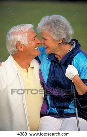 Stock Photo - Senior couple golf. Fotosearch