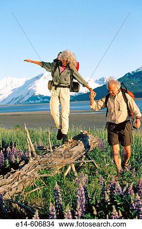 Senior couple hiking. Chugach National Forest. Alaska. USA View Large Photo Image Picture - Senior couple hiking. Chugach National Forest. Alaska. USA. Fotosearch
