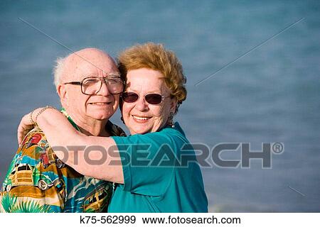 Senior couple hugging View Large Photo Image Stock Photo - Senior couple hugging. Fotosearch