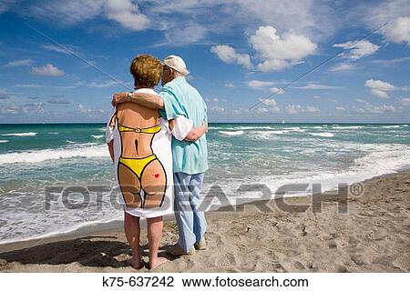 Senior couple hugging, wife wearing fun tee shirt View Large Photo Image Stock Image - Senior couple hugging, wife wearing fun tee shirt. Fotosearch