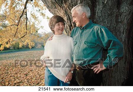 Senior couple in park View Large Photo Image Stock Image - Senior couple in park. Fotosearch