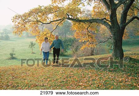 Senior couple in park View Large Photo Image Stock Photo - Senior couple in park. Fotosearch