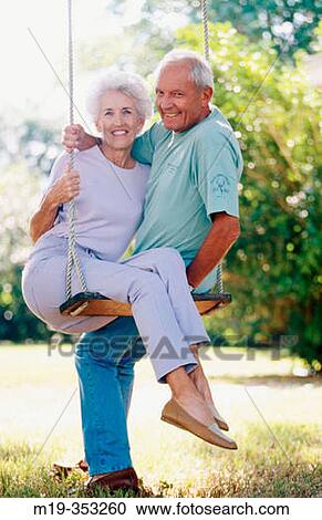 senior couple on a swing View Large Photo Image Stock Image - senior couple on a swing. Fotosearch