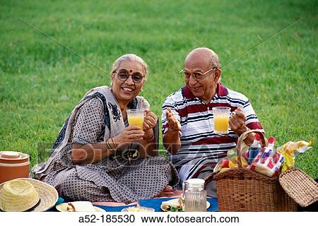 Senior couple on picnic View Large Photo Image Stock Image - Senior couple on picnic. Fotosearch