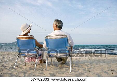 Senior couple on the beach View Large Photo Image Stock Image - Senior couple on the beach. Fotosearch