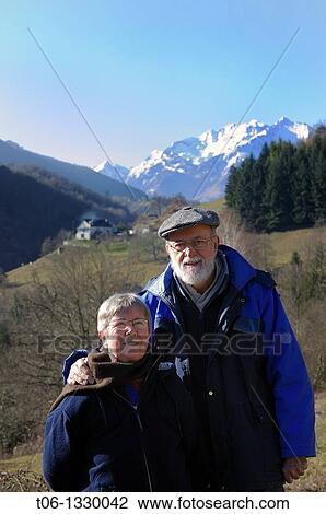 Senior couple on tourism in Azun valley, Pyrenees mountain, Hautes Pyr? n? es, Gascogne, France View Large Photo Image Stock Image - Senior couple on tourism in Azun valley, Pyrenees mountain, Hautes Pyr? n? es, Gascogne, France. Fotosearch