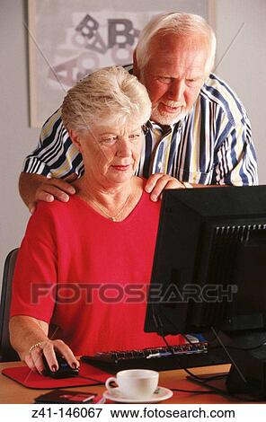 Stock Photo - Senior couple with computer. Fotosearch