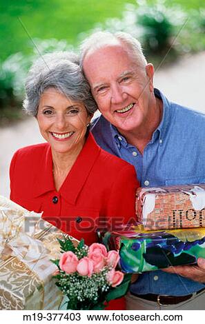 senior couple with packages View Large Photo Image Stock Image - senior couple with packages. Fotosearch