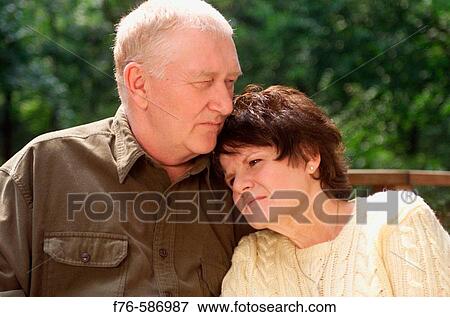 Senior elder couple comforting each other. View Large Photo Image Stock Photo - Senior elder couple comforting each other.. Fotosearch